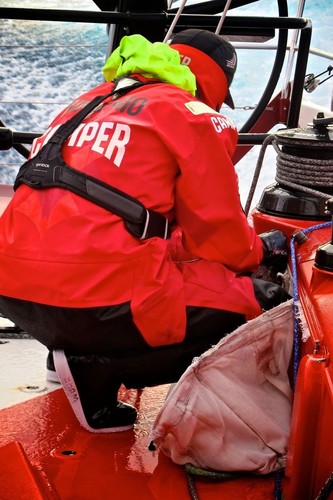 Adam Minoprio inspects a rope tail bag which was ripped from the cockpit by a big wave onboard CAMPER with Emirates Team New Zealand during leg 5 of the Volvo Ocean Race 2011-12, from Auckland, New Zealand to Itajai, Brazil.  © Hamish Hooper/Camper ETNZ/Volvo Ocean Race