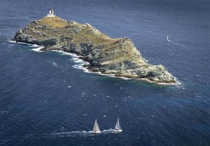 SYMFONY (RUS) and ALIZEE (FRA) at Giraglia Rock - Giraglia Rolex Cup 2012 photo copyright  Rolex/ Kurt Arrigo http://www.regattanews.com taken at  and featuring the  class