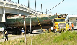 The eighty foot, forty ton, one-of-a-kind Chinese junk Free China barely makes it under the Bethel Island bridge as it  leaves the Marine Emporium in Bethel Island, Calif. on its way to the Fulton Shipyard in Antioch Thursday, April ,19, 2012. Faced with imminent destruction, the historic and culturally significant Chinese junk has been saved and is set to begin its journey to China. (Dan Rosenstrauch/Staff) photo copyright  SW taken at  and featuring the  class