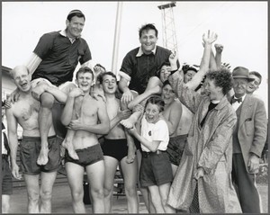 Members of the 9th St Kilda-Elwood Sea Scouts chair the Australian pair of Rolly Tasker and Malcolm Scott after their win on the first day of the 12 sq. m. Sharpie Class, Olympic Games, Port Phillip Bay, Victoria, 1956 - Australian sailing legend Rolly Tasker sails away photo copyright Bruce Howard taken at  and featuring the  class