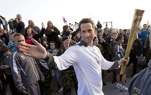 Showman: Ben Ainslie played with the crowd - London 2012 Olympic Games photo copyright AP Associated Press http://www.ap.org/ taken at  and featuring the  class