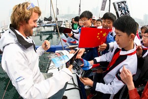 The Wave, Muscats Leigh McMillan meeting local Qingdao children - Extreme Sailing Series 2012 photo copyright QDYA taken at  and featuring the  class