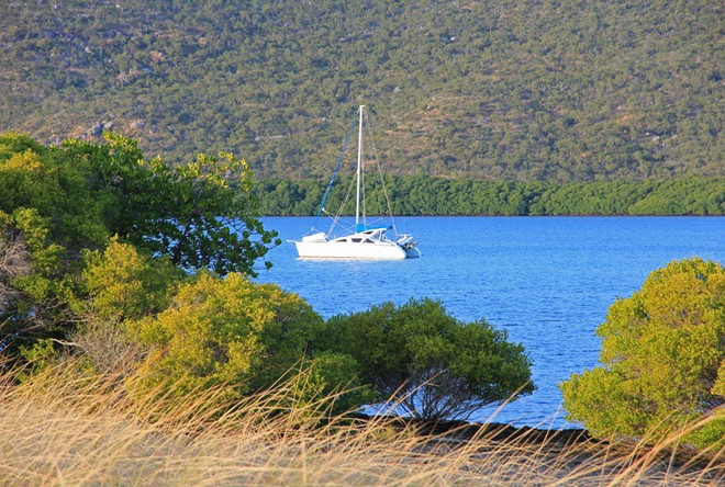 Cruising catamaran anchored in a secluded bay. Just the ticket! ©  John Curnow
