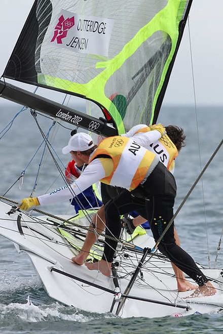 Olympic Games Sailing at Weymouth, Dorset August 2012. Australia’s Nathan Outteridge (helmsman in baseball cap) and Ian Jensen celebrate winning gold in the 49er class at the London Olympics. © Ingrid Abery http://www.ingridabery.com
