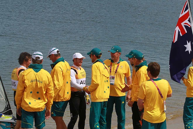 Olympic Games Sailing at Weymouth, Dorset August 2012. Australia’s Nathan Outteridge (helmsman in baseball cap) and Ian Jensen celebrate winning gold in the 49er class at the London Olympics. © Ingrid Abery http://www.ingridabery.com