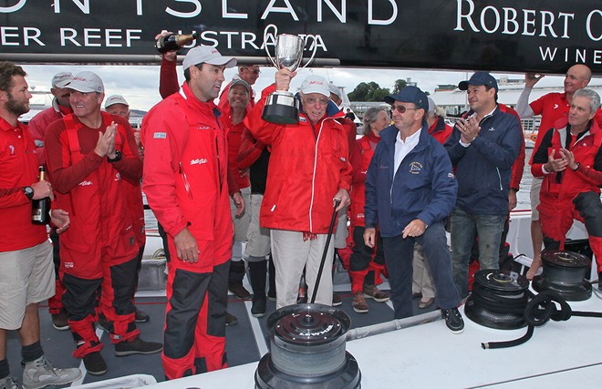 Bob Oatley raises the John Illingworth Trophy - Rolex Sydney Hobart Race 2012 © Crosbie Lorimer http://www.crosbielorimer.com