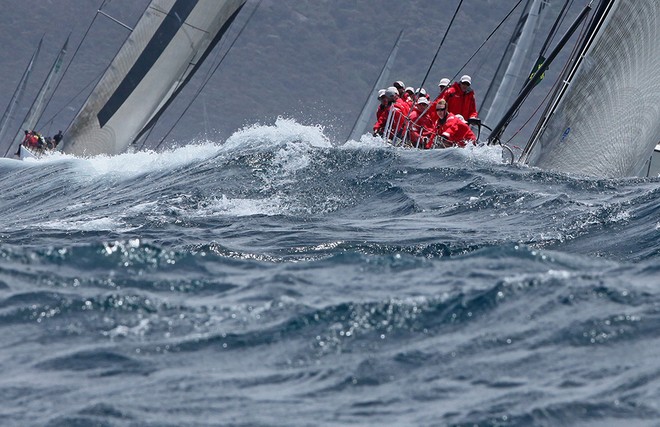 Wild Oats XI leads Ragamuffin Loyal out of the harbour - Rolex Sydney Hobart Race 2012 © Crosbie Lorimer http://www.crosbielorimer.com