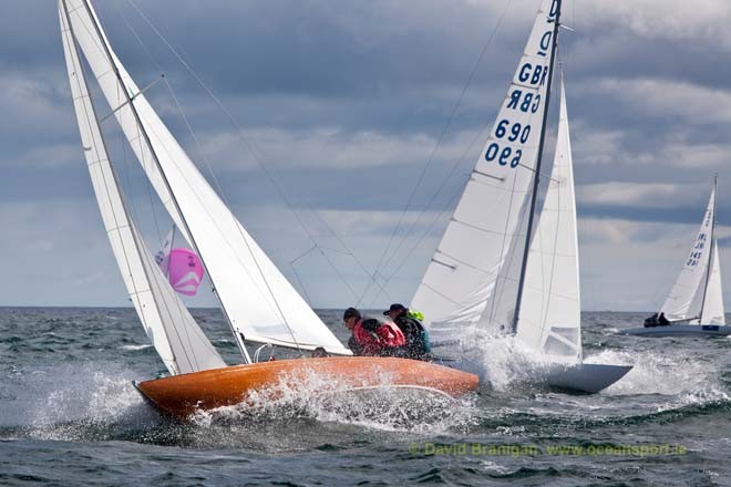 Wednesday 12th September 2012 - Kinsale, Co. Cork: Dan O’Connor’s Leprechaun crosses ahead of David Atkinson’s Blue Movie on the fourth day of racing in the Brewin Dolphin Dragon Gold Cup at Kinsale Yacht Club.<br />
<br />
 © David Branigan - Oceansport.ie