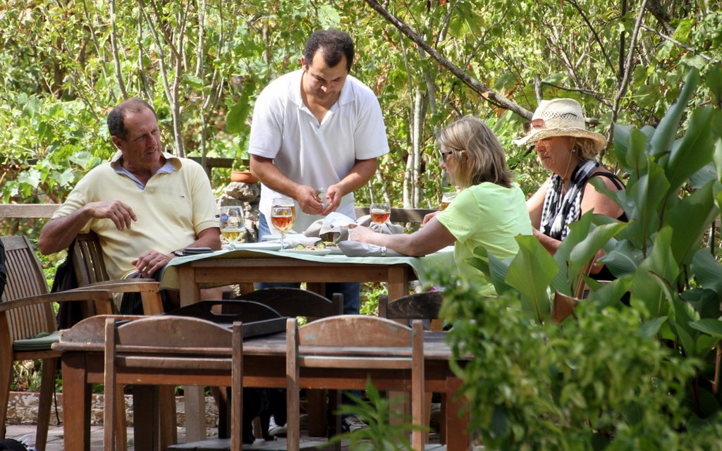 Crew from Mornington lunching after walking the ruins of Kayakoy - Lycian Yacht Rally photo copyright Maggie Joyce taken at  and featuring the  class