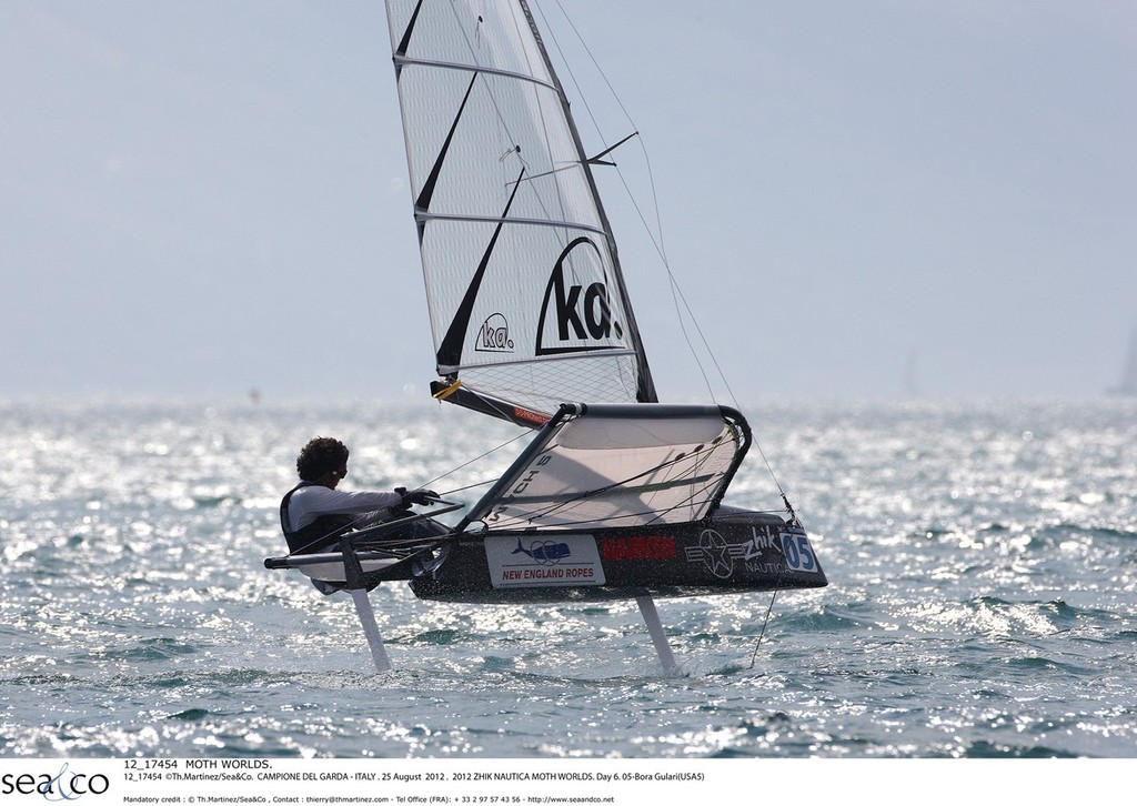 12_17454  ©Th.Martinez/Sea&Co.  CAMPIONE DEL GARDA - ITALY . 25 August  2012 . 
2012 ZHIK NAUTICA MOTH WORLDS. Day 6.
05-Bora Gulari(USA5) photo copyright Th Martinez.com http://www.thmartinez.com taken at  and featuring the  class