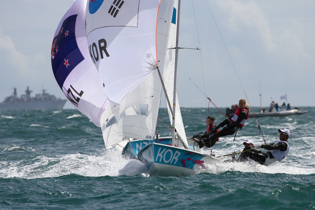 Korea chased by NZL going for the finish - Day 9 2012 Olympic Regatta, Weymouth photo copyright Richard Gladwell www.photosport.co.nz taken at  and featuring the  class