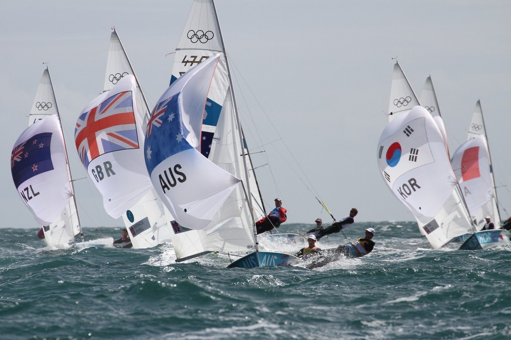 Lead group heading for the finish - Day 9 2012 Olympic Regatta, Weymouth photo copyright Richard Gladwell www.photosport.co.nz taken at  and featuring the  class