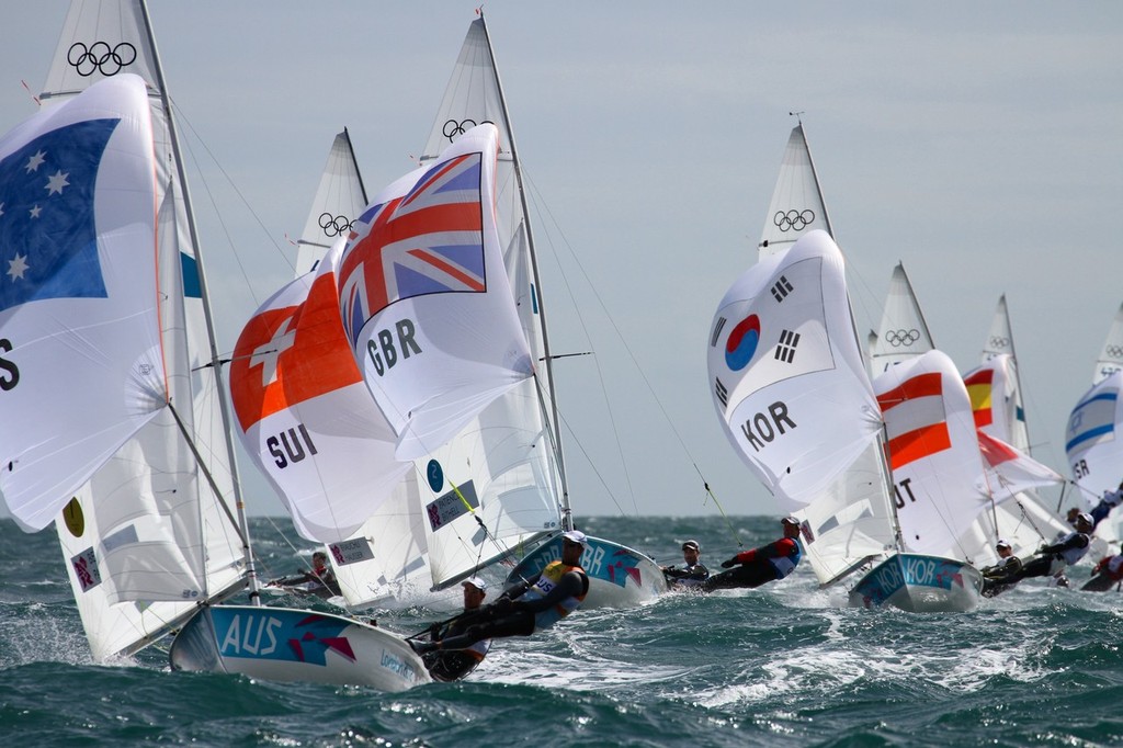 Fleet contest the finish - Day 9 2012 Olympic Regatta, Weymouth photo copyright Richard Gladwell www.photosport.co.nz taken at  and featuring the  class