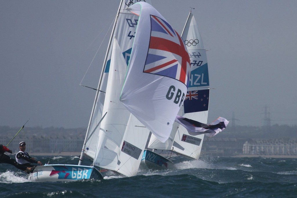 August 1, 2012 - Weymouth, England - 470 Men - Paul Snow -Hansen and Jason Saunders (NZL) sailing in their first  Olympic race, flog their spinnaker in second place on Race 1 © Richard Gladwell www.photosport.co.nz