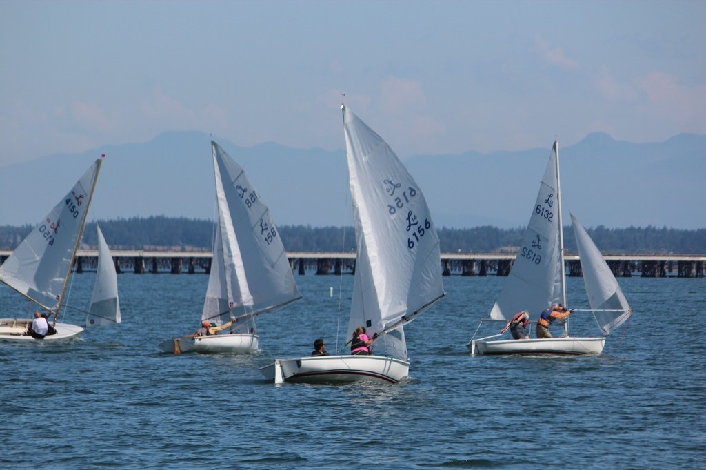 Downwind leg with Cascade Mountain  range in background - 2012 Lido 14 National Championships © Tony Billera