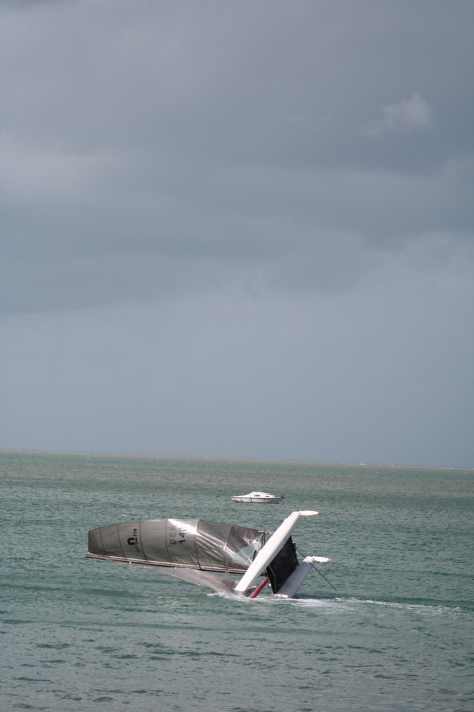 Sneakin-It cart wheels on Day two - 34th Nacra Catamaran Australian Championships © Christie Guinea