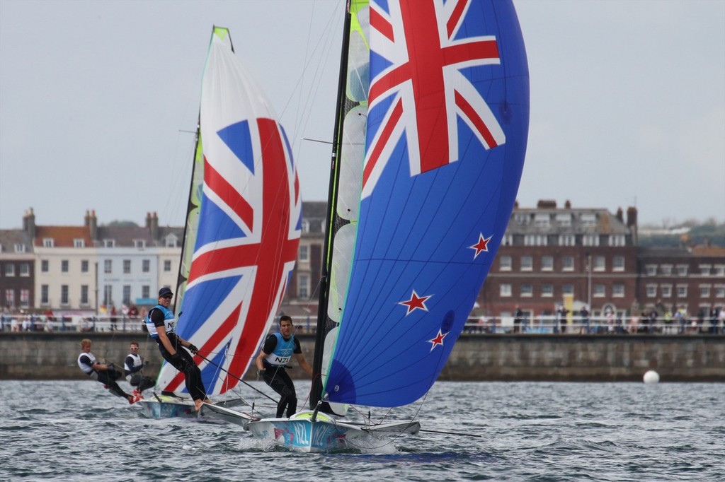  Flashback New Zealand Olympic Silver medalists in the 49er class in action off Weymouth at the 2012 Olympics © Richard Gladwell www.photosport.co.nz