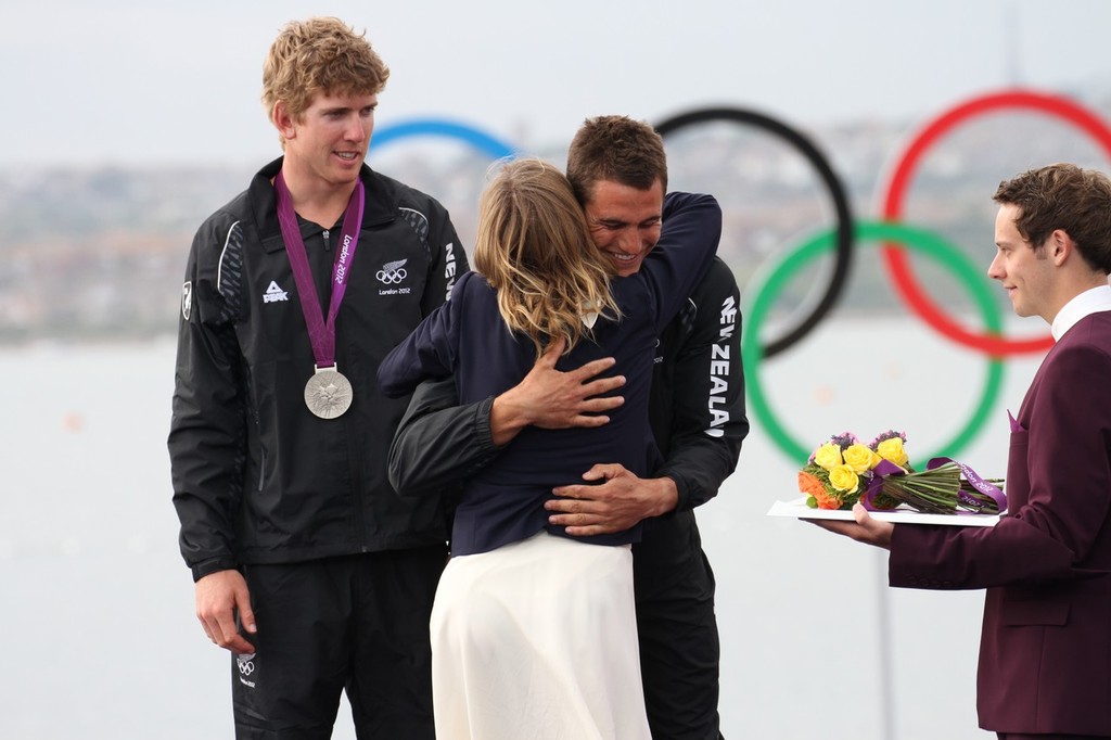  August 7, 2012 - Weymouth, England - Blair Tuke and Peter Burling receive their Silver medals from Barbara Kendall - photo © Richard Gladwell www.photosport.co.nz