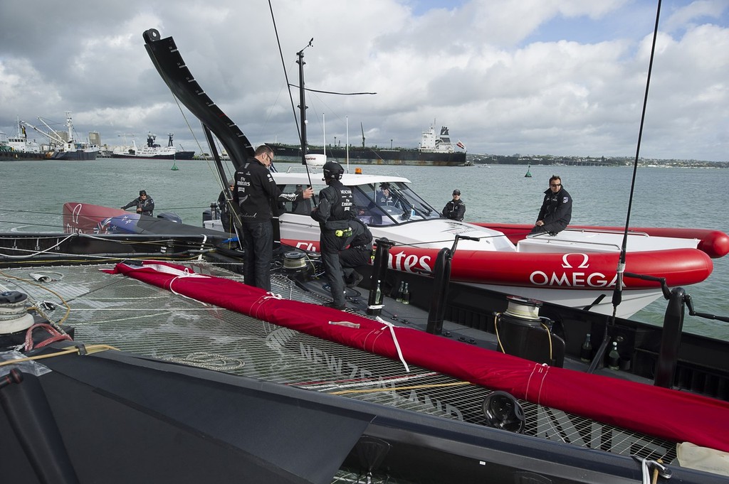 Chase 1 manouvers the AC72 out of the Viaduct. Emirates Team New Zealand. Day 13 of testing for the team’s first AC72. Hauraki Gulf, Auckland. photo copyright Chris Cameron/ETNZ http://www.chriscameron.co.nz taken at  and featuring the  class