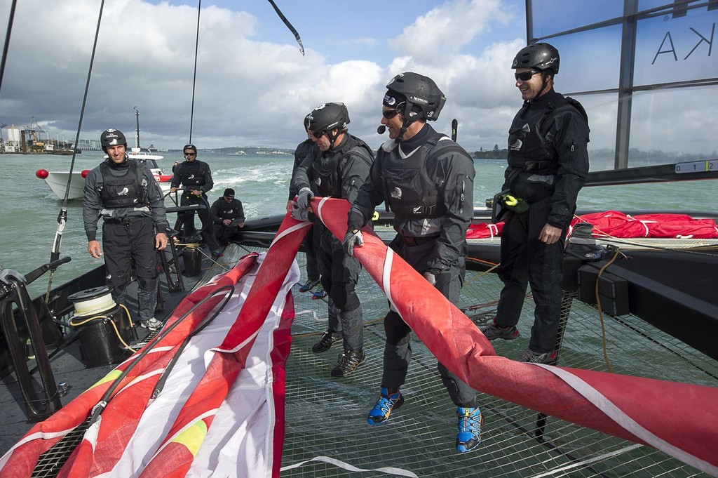 Preparing to hoist the Genoa. Emirates Team New Zealand. Day 13 of testing for the team’s first AC72. Hauraki Gulf, Auckland.  © Chris Cameron/ETNZ http://www.chriscameron.co.nz
