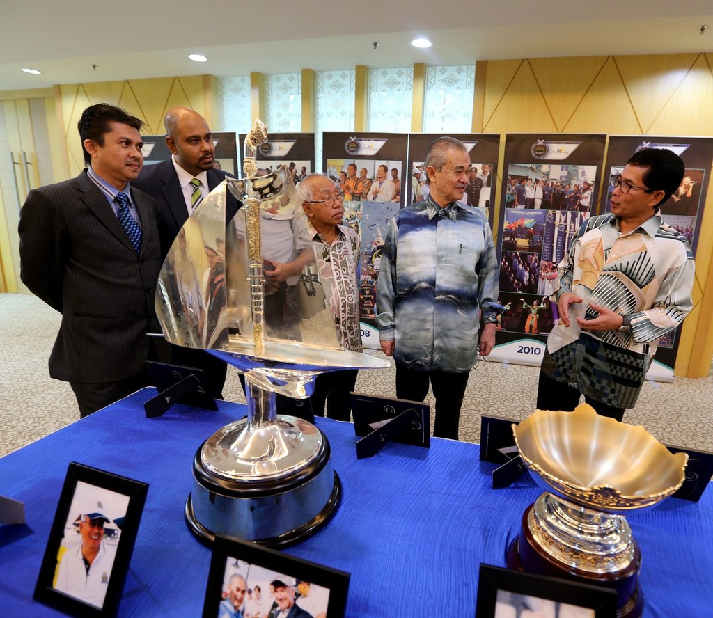 Dato Wan Hisham walks Tun Abdullah Haji Ahmad Badawi the Monsoon Cup memory lane display while Tan Sri Sabbaruddin Chik, Abdul Shaheed Yusof and Ahmad Fathil Abdul Ghani look on - WMRT Monsoon Cup 2012 photo copyright Monsoon Cup Media . http://www.monsooncup.com.my taken at  and featuring the  class