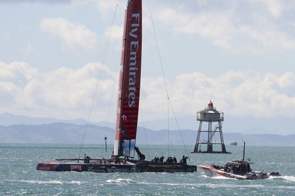 Emiartes Team NZ drops the tow at Bean Rock in Day 10  - Emirates Team NZ AC72 October 12,2012 photo copyright Richard Gladwell www.photosport.co.nz taken at  and featuring the  class