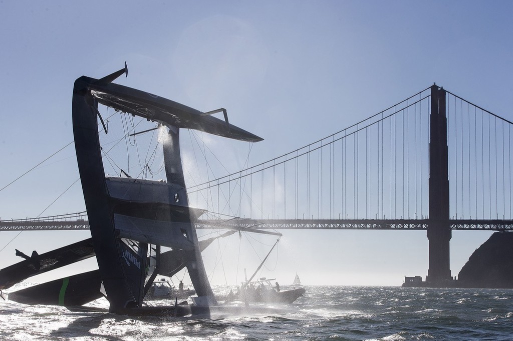 17/10/2012 - San Francisco (USA,CA) 34th America’s Cup - ORACLE Team USA AC 72 capsizes during training in San Francisco Bay and is pushed out of the bay by the tide current as the team try to salvage the platform. - Oracle Team USA capsize AC72 Oct 16, 2012 &copy; Guilain Grenier Oracle Team USA http://www.oracleteamusamedia.com/