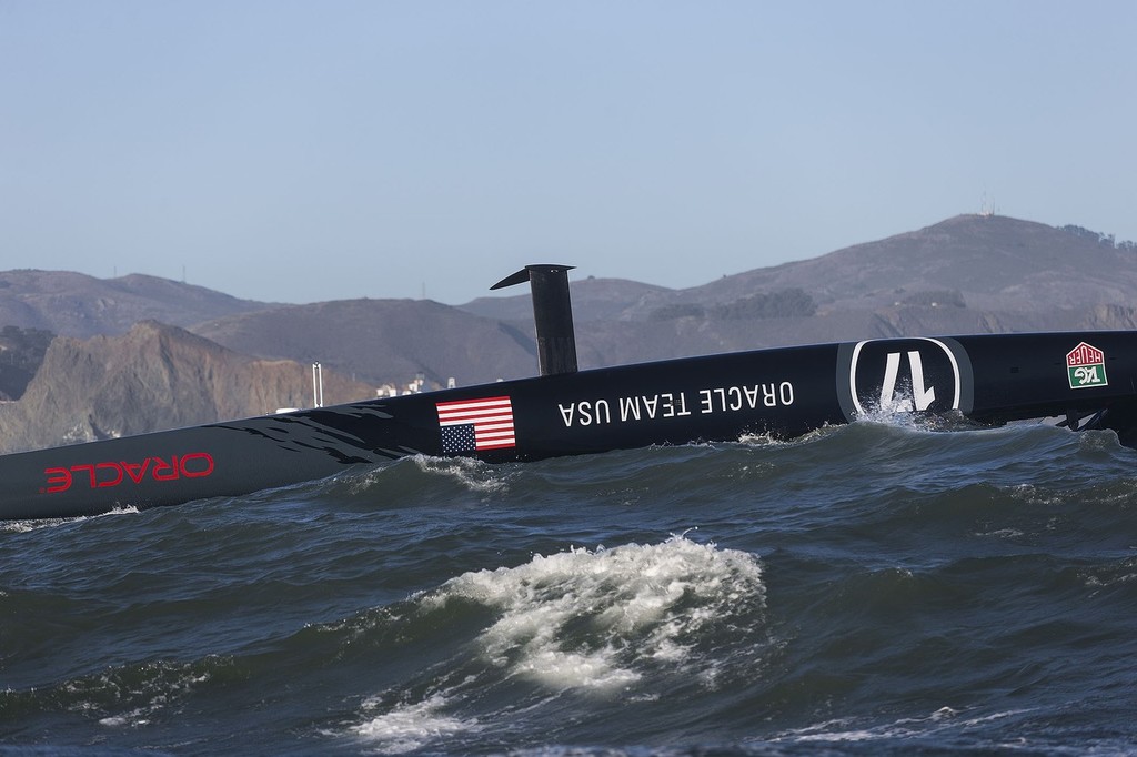 17/10/2012 - San Francisco (USA,CA) 34th America’s Cup - ORACLE Team USA AC 72 capsizes during training in San Francisco Bay and is pushed out of the bay by the tide current as the team try to salvage the platform. - Oracle Team USA capsize AC72 Oct 16, 2012 &copy; Guilain Grenier Oracle Team USA http://www.oracleteamusamedia.com/