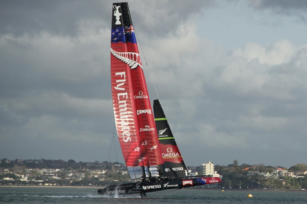 1 - Emirates Team NZ - AC72 - rears slightly experiencing an increase in windstrength off North Head  September 6, 2012 © Wright Images http://www.sail-world.com