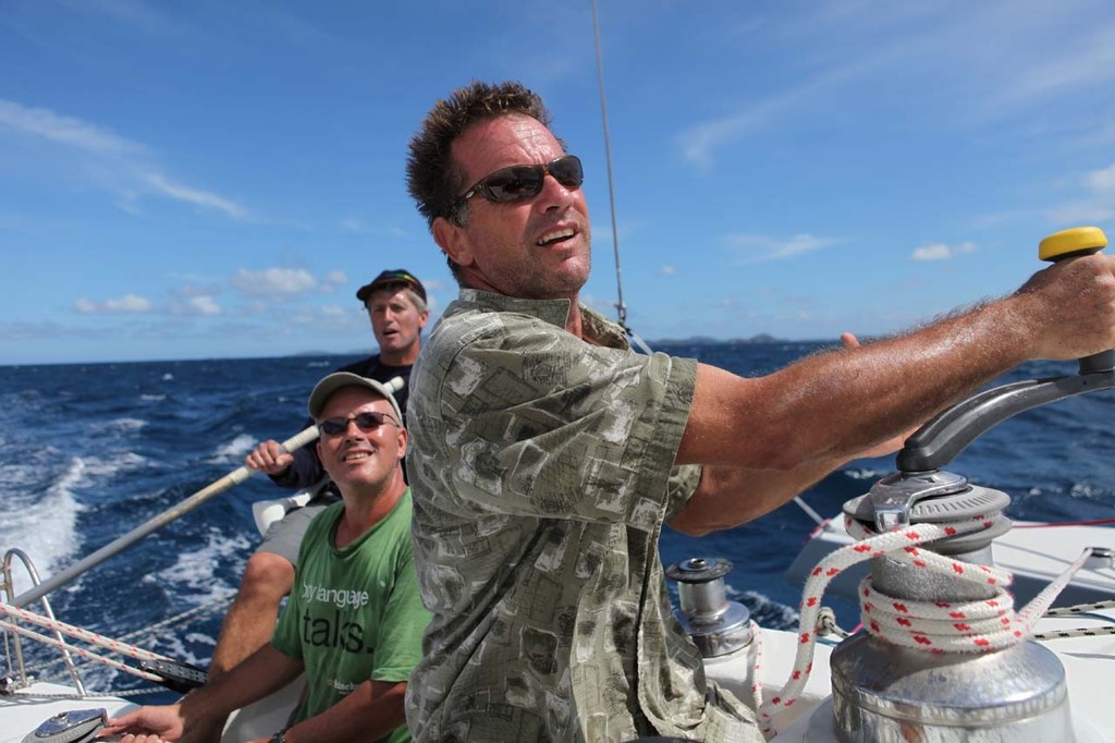 Tom Echle trimming the mainsail flanked by Steve Davis and Richard Wooldridge © Broadsword Communications