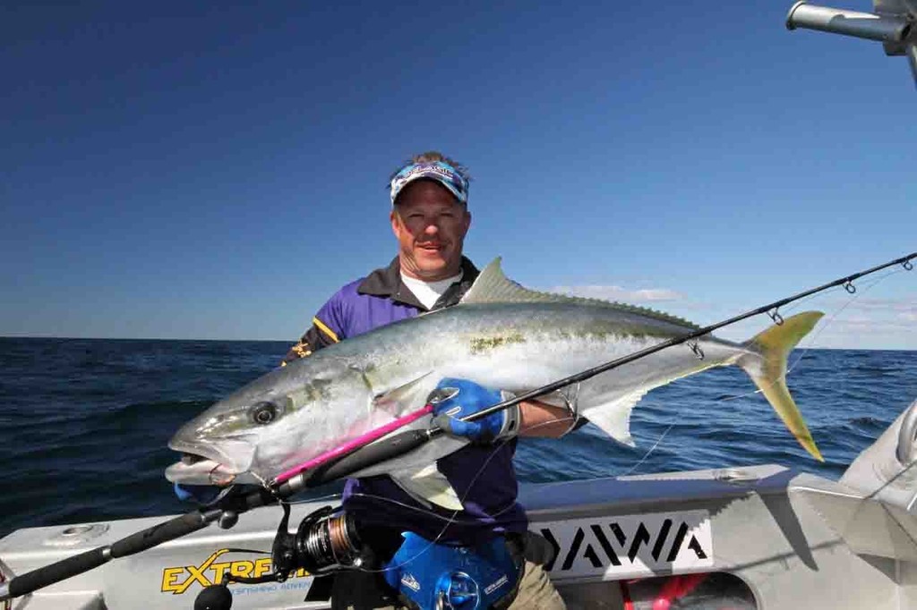 The author displays a solid kingfish caught from the depths. © Jarrod Day