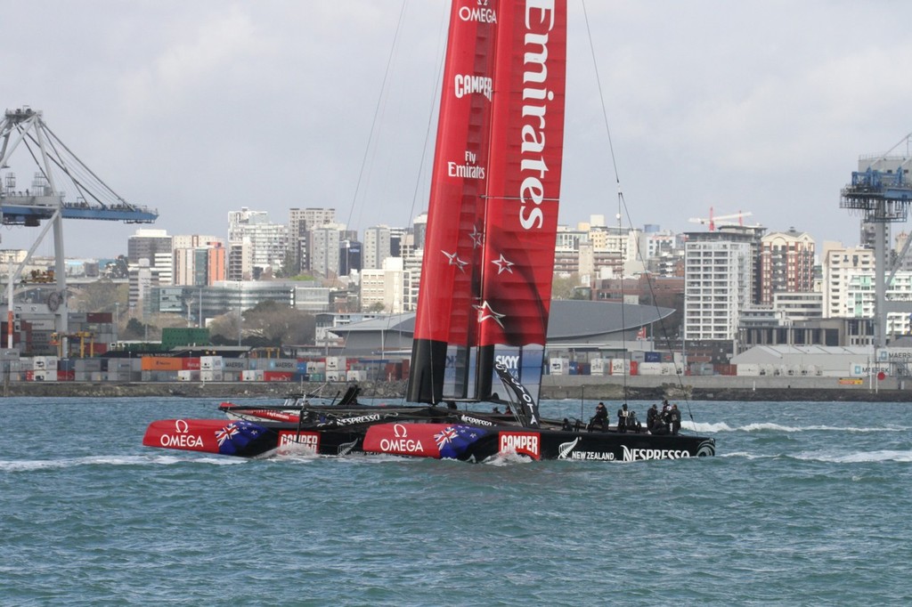 Emirates Team NZ’s AC72  tows out of the Waitemata Harbour © Richard Gladwell www.photosport.co.nz