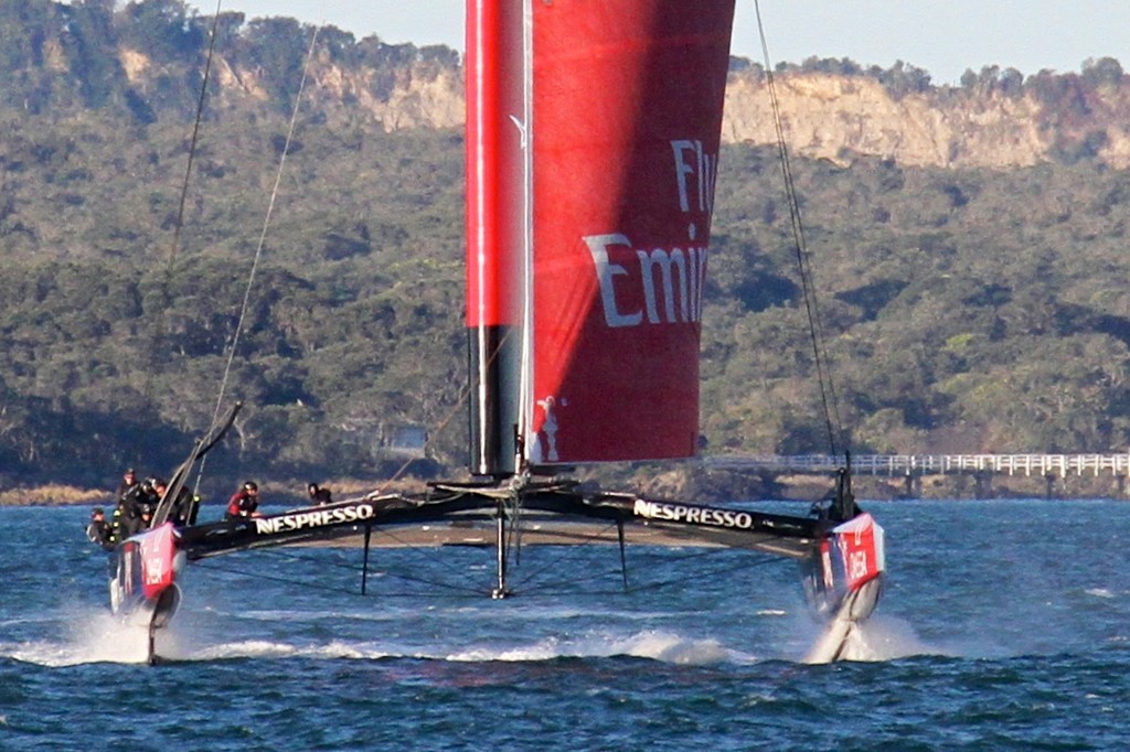 IMG 8361 - Emirates Team NZ fully lifted on both foils, note the slimness of the hulls in this bow on shot. gennaker is still not fully drawing as apparent wind is still moving ahead.  © Richard Gladwell www.photosport.co.nz