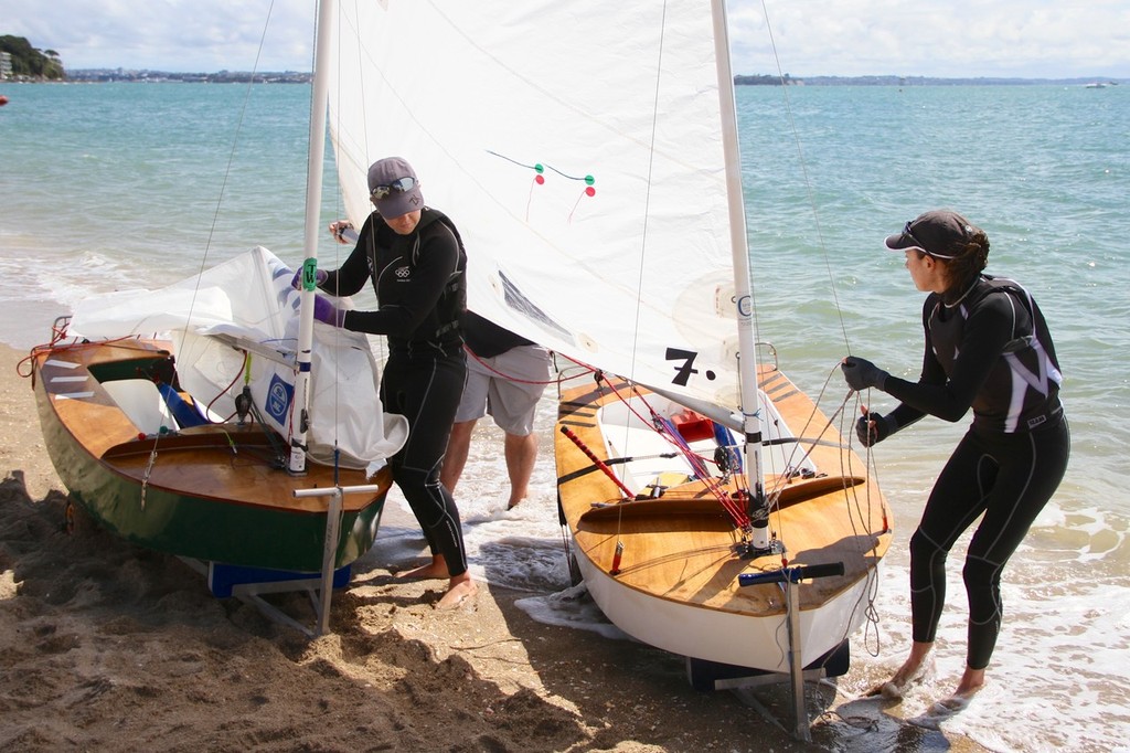 Olivia Powrie and Jo Aleh  unrig their  P-Class at Kohimaramara Yacht Club  Sunday September 23, 2012 © Richard Gladwell www.photosport.co.nz