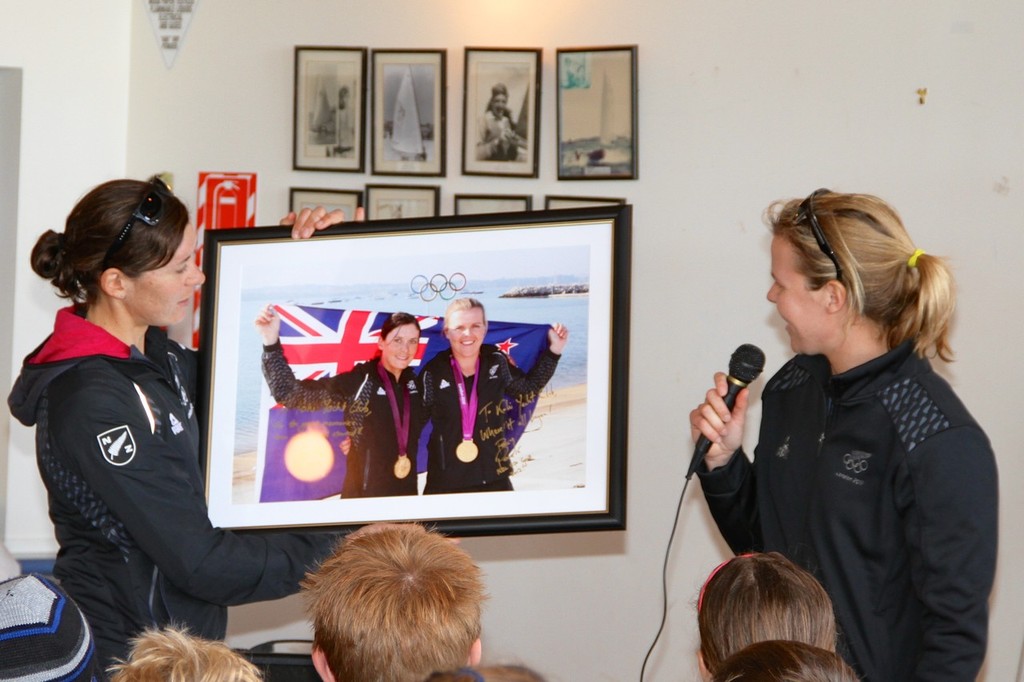 Jo Aleh and Olivia Powrie make a presention to the Kohimaramara Yacht Club  Sunday September 23, 2012  © Richard Gladwell www.photosport.co.nz