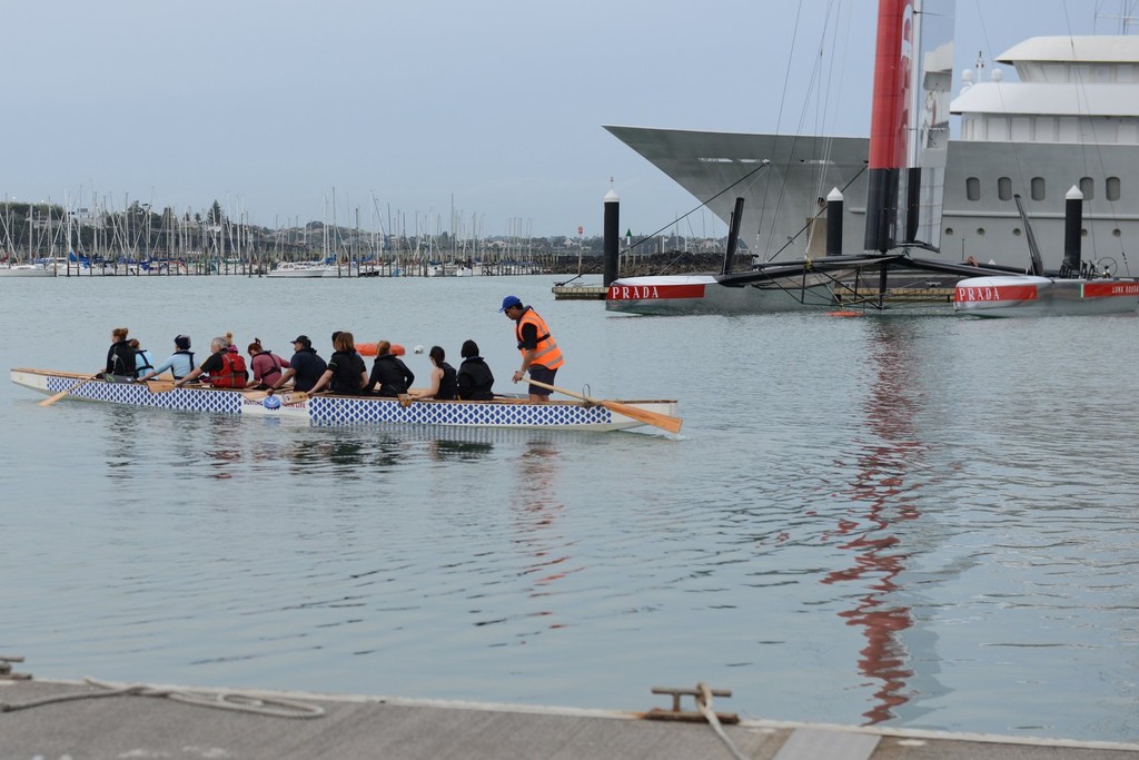 A waka crosses Luna Rossa November 19, 2012 Westhaven -  © Sail-World.com/NZ 