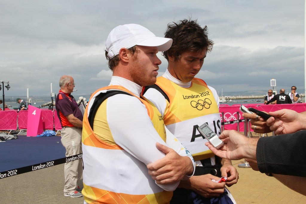 August 8, 2012 - Weymouth, England - Nathan Outteridge and Iain Jensen (AUS) Gold Medal winners - speak with the Media in the Mixed Zone © Richard Gladwell www.photosport.co.nz