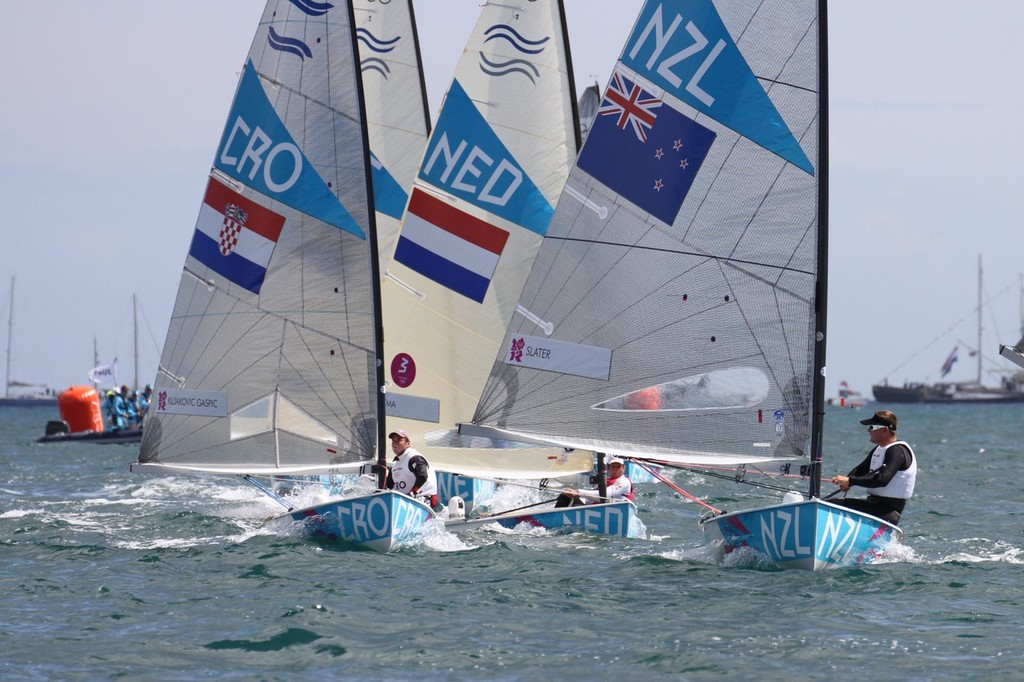 After the penalty turn, J-P Postma dropped back to 5th place overall in the Finn class Medal Race, 2012 Olympic Regatta. Third placegetter in the race, Rafael Trujillo (ESP) is just out of the picture to the right photo copyright Richard Gladwell www.photosport.co.nz taken at  and featuring the  class