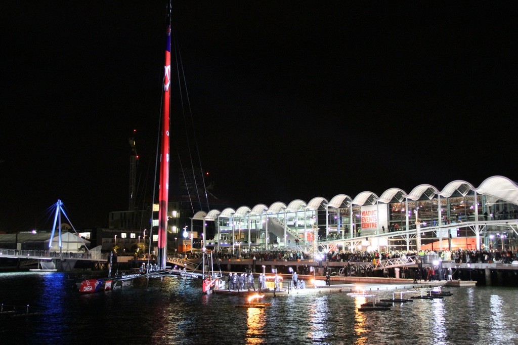 July 21, 2012 America's Cup - Emirates Team NZ Launch at the Viaduct Harbour, Auckland. Emirates Team NZ's AC72 in front of the crowded Viaduct Events Centre © Richard Gladwell www.photosport.co.nz