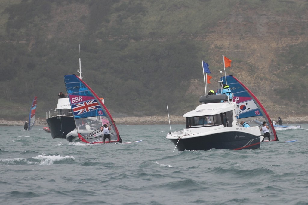 July 31, 2012  Mens Windsurfer, Nick Dempsey finish photo copyright Richard Gladwell www.photosport.co.nz taken at  and featuring the  class