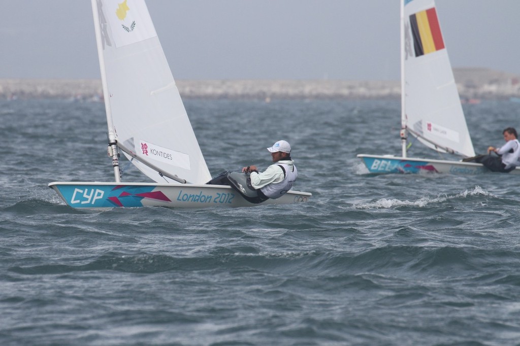 July 31, 2012  Pavlos Kontides (CYP) in fourth place in the Mens Singlehander Laser racing on the Portland course photo copyright Richard Gladwell www.photosport.co.nz taken at  and featuring the  class