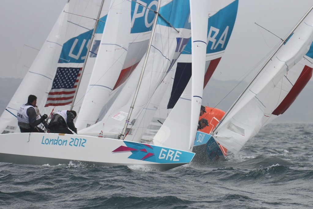 July 31, 2012  Mens Two Handed Keelboat - melee at first rounding mark  © Richard Gladwell www.photosport.co.nz