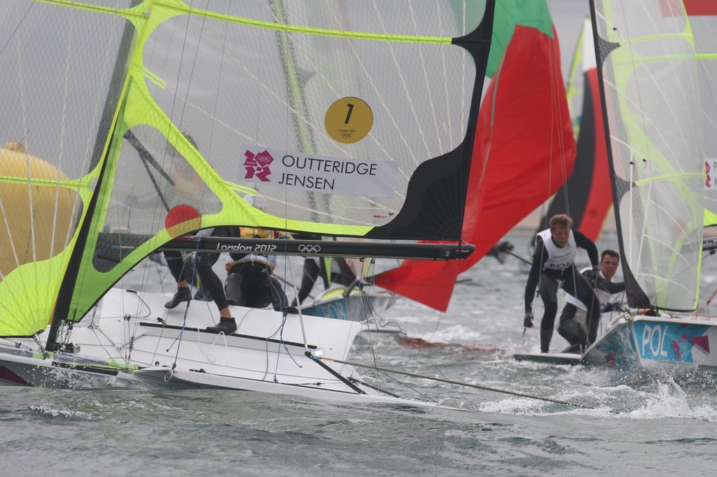 August 1, 2012 - Weymouth, England - 49er leaders Nathan Outteridge and Iain Jensen (AUS) in hot pursuit of the Gold Medal photo copyright Richard Gladwell www.photosport.co.nz taken at  and featuring the  class