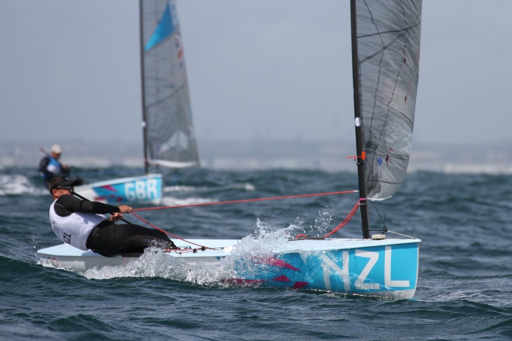  August 3, 2012 - Weymouth, England - Dan Slater (NZL) Finn class - Day 6 - with Ben Ainslie (GBR) astern - photo © Richard Gladwell www.photosport.co.nz