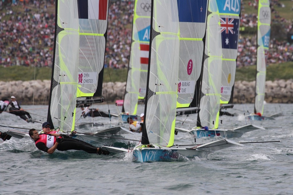  August 3, 2012 - Weymouth, England - Peter Burling and Blair Tuke (NZL) lead the 49er class racing in front of a big crowd on the Nothe course. photo copyright Richard Gladwell www.photosport.co.nz taken at  and featuring the  class