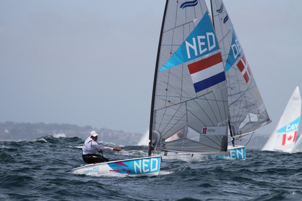  August 3, 2012 - Weymouth, England - Jan-Pieter Postma (NED)  moves into Gold medal contention with a win in Race 9 in the Finn class photo copyright Richard Gladwell www.photosport.co.nz taken at  and featuring the  class