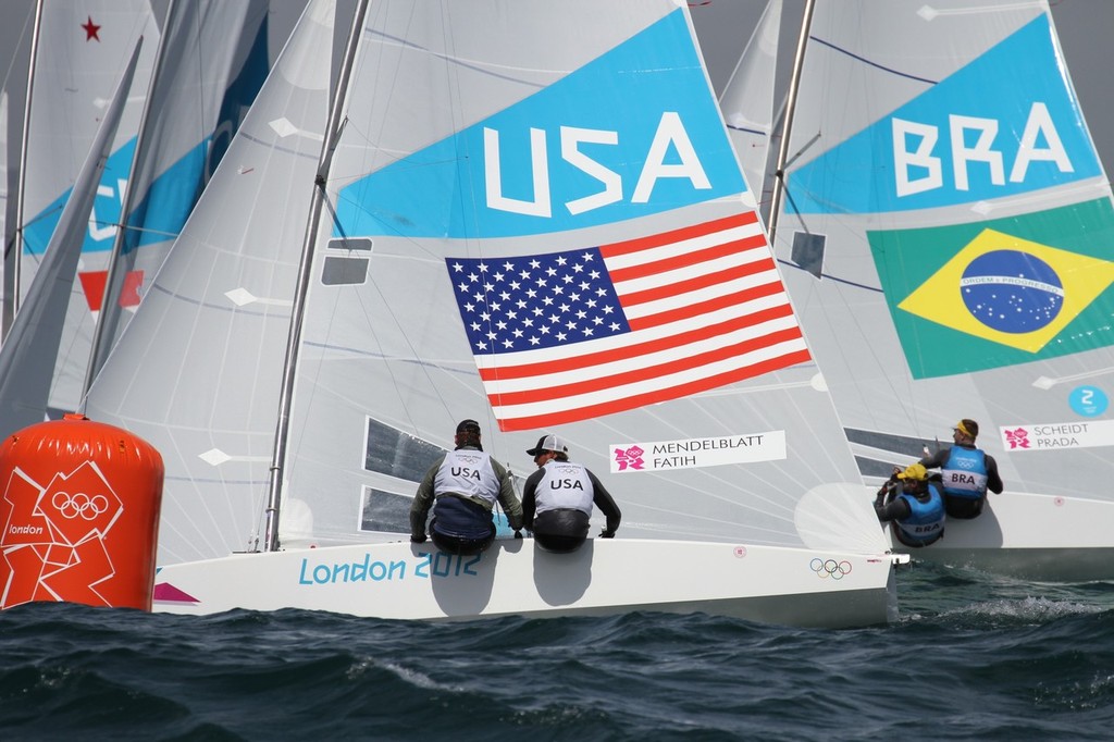  August 3, 2012 - Weymouth, England - Mark Mendelblatt and Brian Faith (USA) in the leading group at the first mark in the Star class photo copyright Richard Gladwell www.photosport.co.nz taken at  and featuring the  class