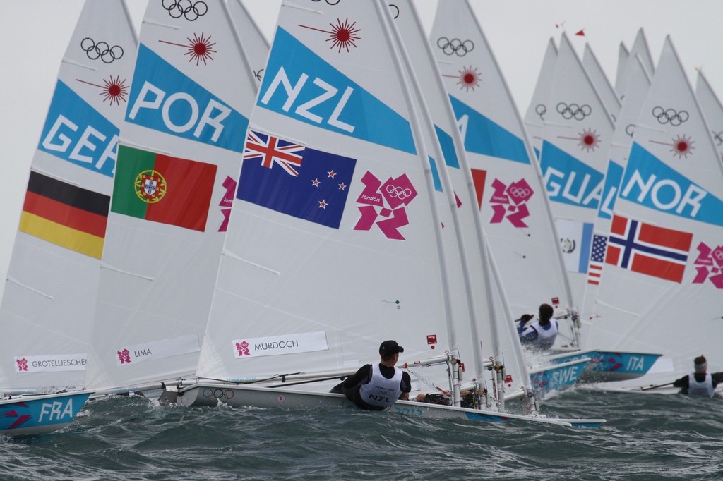  August 4, 2012 - Weymouth, England - Andrew Murdoch gets off to a good start in the first race of the Mens Singlehander (Laser) on Day 7 photo copyright Richard Gladwell www.photosport.co.nz taken at  and featuring the  class