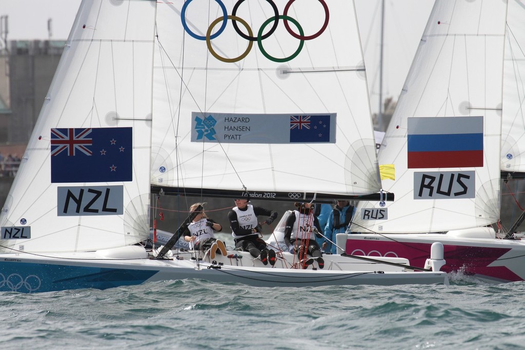  August 4, 2012 - Weymouth, England - The New Zealand crew fight elimination against the second placed Russian crew in the final day of the Qualification Round. © Richard Gladwell www.photosport.co.nz