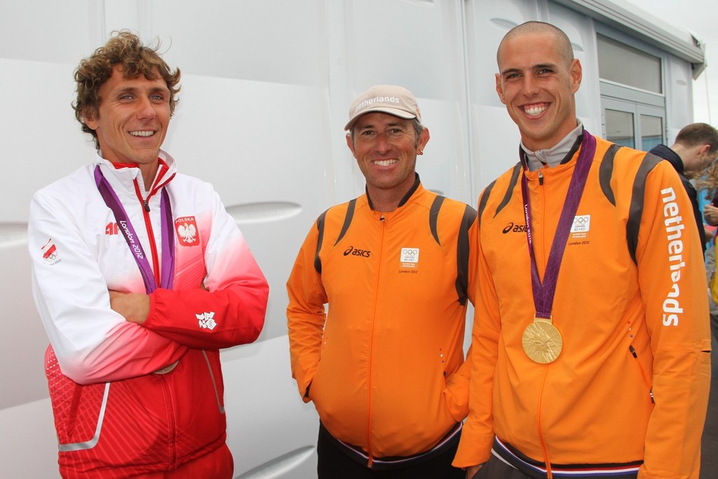 Flashback to 2012 - Przemyslaw Miarczynski (POL - Bronze medalist), Aaron MacIntosh (NZL - NED Coach), and Dorian van Rijsseleberge (NED - Gold Medalist) photo copyright Richard Gladwell www.photosport.co.nz taken at  and featuring the  class